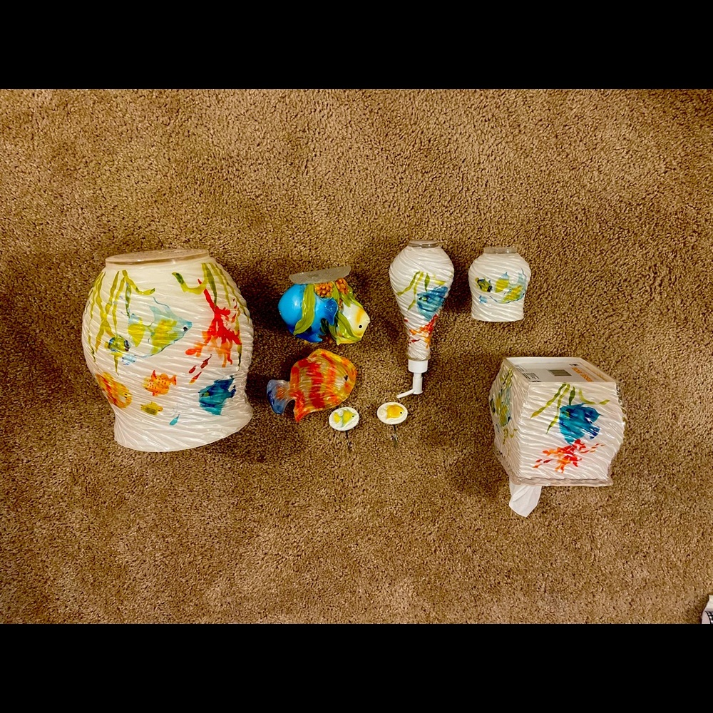 toothbrush holder, soap dispenser, soap dish, tissue box, tumbler, shower hooks